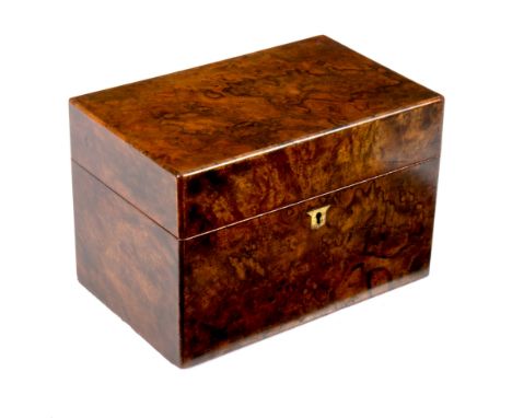An early Victorian burr walnut tea caddy, fitted two domed hinged lidded compartments, 25cm wide CONDITION REPORT: Outer vene