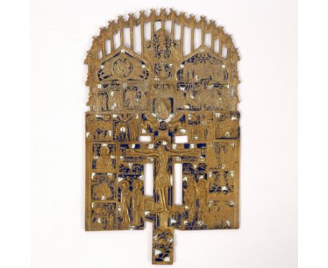 A gilt Orthodox portable icon decorated in blue and white enamel, depicting numerous scenes of the life of Christ with centra