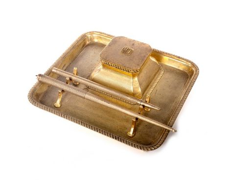 An Art Deco silver gilt inkstand and pen tray, Asprey &amp; Co., Birmingham 1930, the inkwell with square canted cover initia