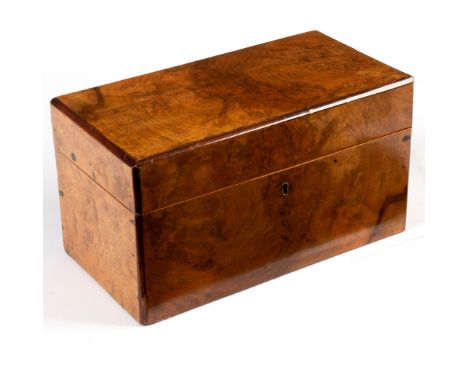 A Victorian walnut tea caddy enclosing two lidded compartments flanking a mixing bowl, 30cm wide CONDITION REPORT: Caddy fine