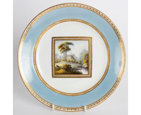 A Spode plate made for the Prince of Wales, circa 1806-10, painted with a central landscape panel within a gilt and pearl fra