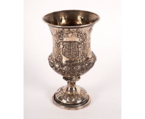 A Victorian silver goblet, London 1863, with armorial to side, 17cm high, approximately 222gm CONDITION REPORT: Some light we