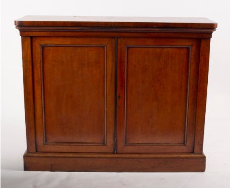 A Victorian mahogany side cabinet, enclosed by panel doors on a plinth base, 120cm wide