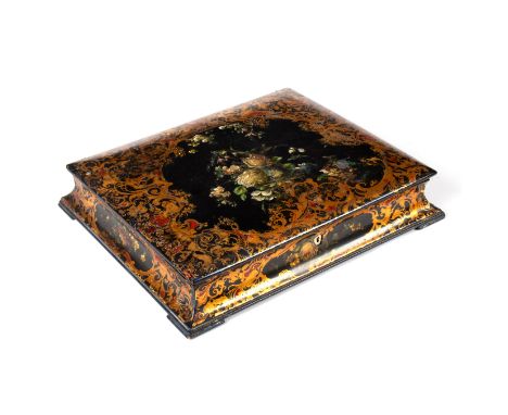 A Victorian papier-mâché desk companion, Clay, King St, Covent garden, decorated flowers within gilt borders, paper lined int