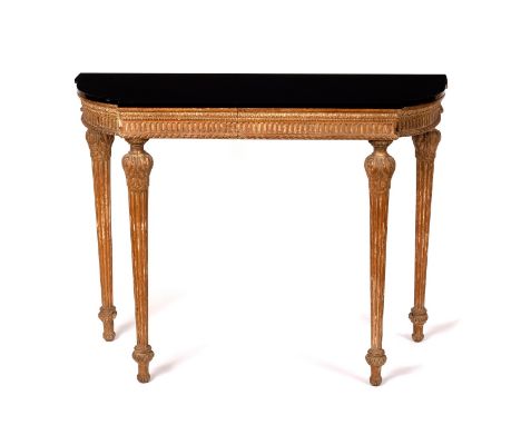 An 18th Century style console table with fluted frieze, on acanthus capped fluted taper legs, 115cm wide/see illustration