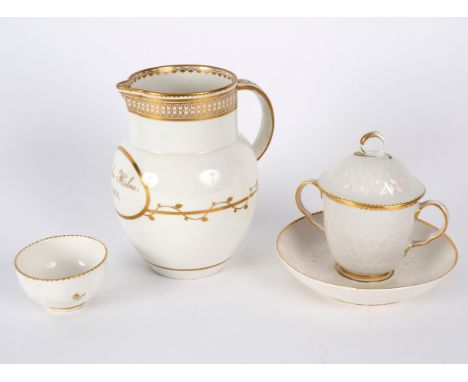 A Derby jug inscribed gilt 'Sophia Holme 1801', a feather moulded caudle cup, cover and stand, and a tea bowl  CONDITION REPO