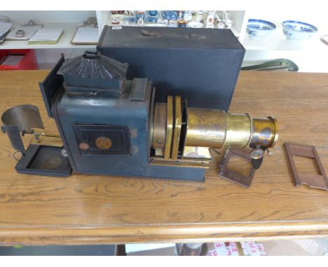 A 19th century Magic Lantern with adjustable brass lense carry case and attachments for gas - 55cm extended
