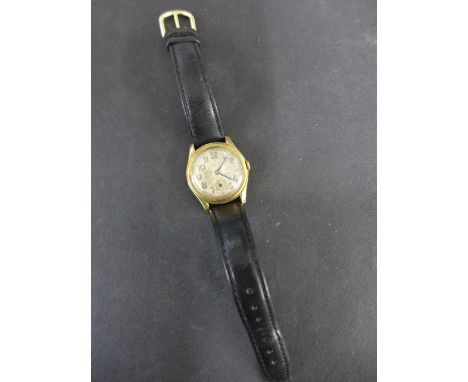 A 9ct yellow gold mid sized Rolex manual wind wristwatch 15 jewel movement - 31mm wide including winder - working, some usage