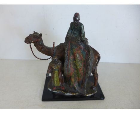 A Spelter table lighter - The Carpet Seller - Height 19cm - missing its pull, some wear and chip to base but original painted