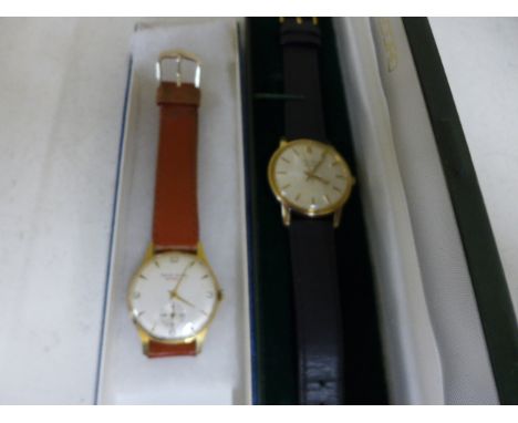 Two manual wind Gentlemen's watches, a boxed Record de Luxe, Swiss made and a made in England Smiths Astral National 15, the 