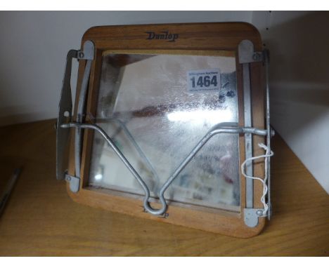 A Dunlop tennis racket mirror