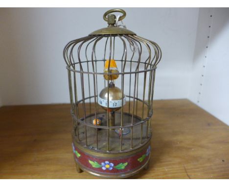A reproduction brass cased automaton bird clock