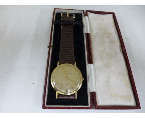 An 18ct manual wind Girard Perregaux watch containing a G P 17 Jewel movement, this is a top quality gold Swiss watch - 34mm 