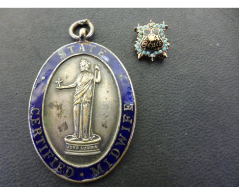 A gold enamel and opal fraternity pin Zeta Tau Alpha - an American Women Fraternity founded in 1898 in Virgina - this pin ins