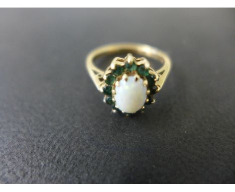 A 9ct opal ring - size M - Weight approx. 3gmsCondition report:  In good condition 