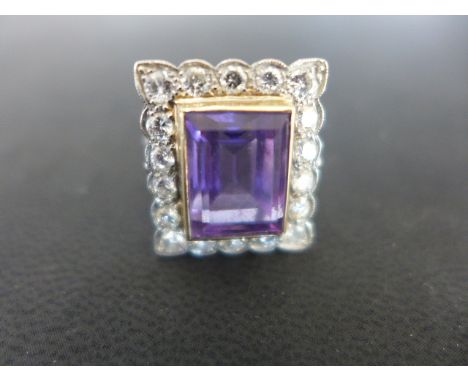 A platinum amethyst and diamond ring size R/S - centre stone approx 12mm x 9mm x 7.5mm deep - approx weight 8.4 grams - stone