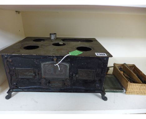 A Marklin type Victorian toy cooker with spirit burner and accessories 