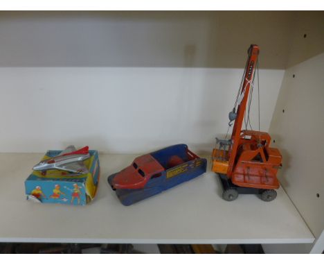 Three tin plate toys including a Tri-ang Jones KL44 crane, a boxed Wells-Brimtoy Wonderjet and an Arrow Special Delivery wago