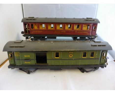 Two Marklin O gauge tinplate coaches comprising a Mitropa Schlafwagen corridor coach and a 18440 Baggage Car, both 28.5cm. (l