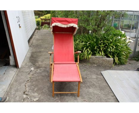 A c1950's vintage retro Ocean chair by Geebro with sunshade, foot rest & original red canvas.* Please Note: A further 500 lot