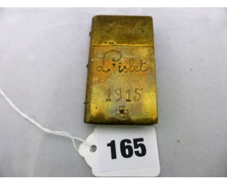 A WWI brass book form trench art lighter, Guernsey interest engraved 'FRC L'islet 1915'.* Please Note: A further 500 lots fro