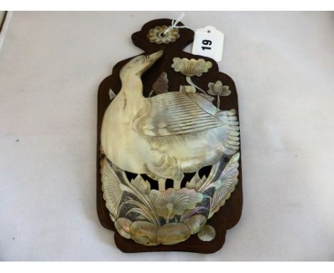 An antique Oriental carved Mother of Pearl wall pocket depicting a duck and lotus flowers* Please Note: A further 500 lots fr