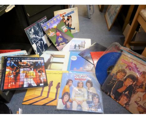 A large quantity of various vintage LP's (25) comprising Pink Floyd, Dire Straits, The Rolling Stones, The Monkeys, Bay City 