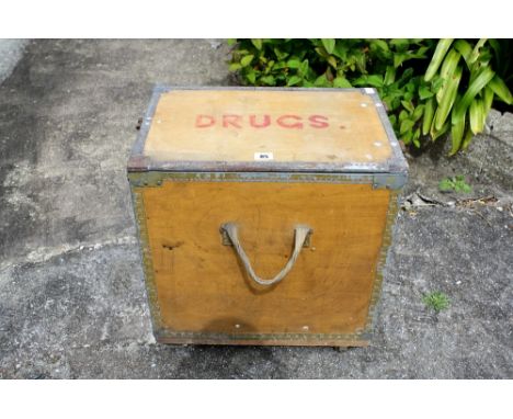 A vintage drugs box on castors.* Please Note: A further 500 lots from this sale (which are not available for live bidding) ca