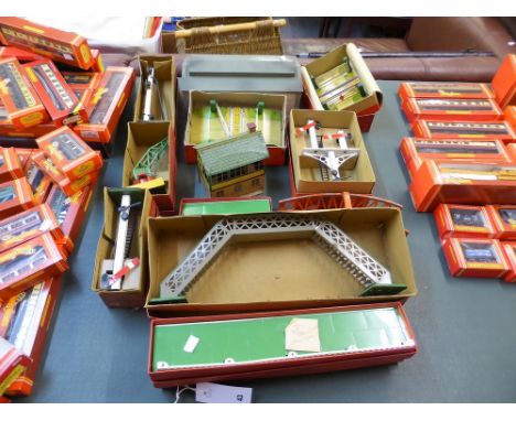 A large quantity of boxed 1950s O gauge Hornby accessories comprising No.1 Footbridge Ref No: 42310; Level crossing No.1 Ref 