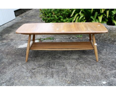 A vintage Ercol Windsor coffee table.* Please Note: A further 500 lots from this sale (which are not available for live biddi