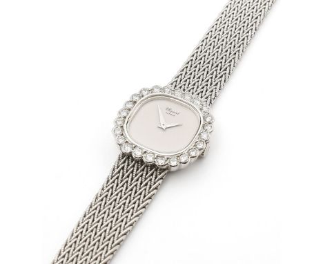 Damenarmbanduhr, Chopard. 750/000 WG-Gehäuse und originales -Flechtarmband mit Schließe, brutto 48 g. Lunette besetzt mit 24 