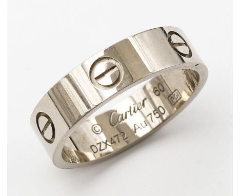 "LOVE-Ring", Cartier. 750/000 WG, 7,1 g. Umlaufend ziseliertes Dekor in Form von Schraubenköpfen. Schiene mit Mz. Cartier, nu