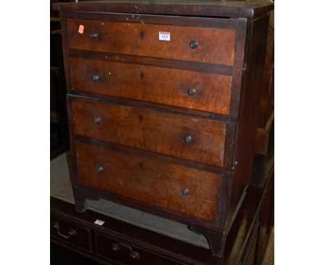 A mahogany and pollard oak double door commode cupboard, in the form of a chest