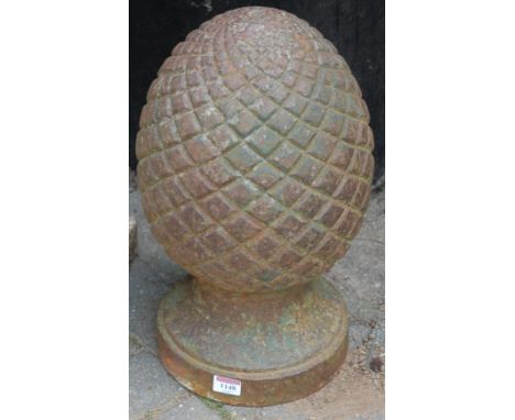 A cast iron pineapple garden finial, h.44cm