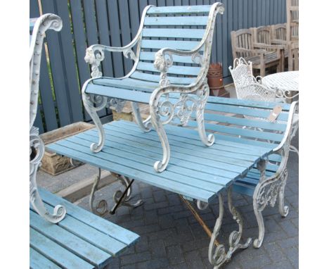 A painted cast metal ended and teak slatted rectangular garden table, together with matching two-seater garden bench, and sin