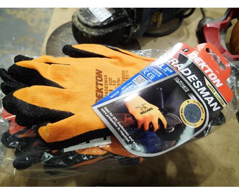 Twelve pairs of new and unused Dekton work gloves. P&amp;P Group 2 (£18+VAT for the first lot and £3+VAT for subsequent lots)