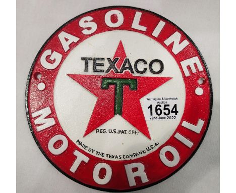 Cast iron Texaco wall plaque, D: 20 cm. P&amp;P Group 2 (£18+VAT for the first lot and £3+VAT for subsequent lots) 