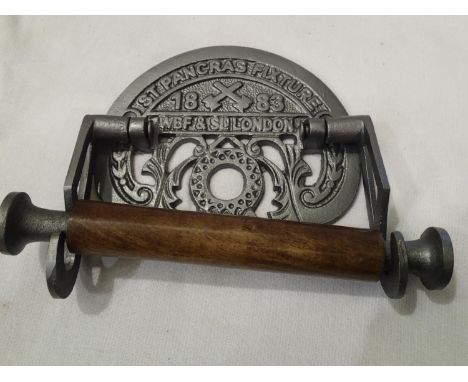 Cast iron St Pancras toilet roll holder, 20 x 14 cm. P&amp;P Group 2 (£18+VAT for the first lot and £3+VAT for subsequent lot