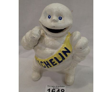 Cast iron Michelin Man small money box, H: 16 cm. P&amp;P Group 2 (£18+VAT for the first lot and £3+VAT for subsequent lots) 