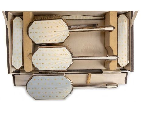 GEORGE VI SILVER AND ENAMEL DRESSING TABLE SET, ALBERT CARTER, BIRMINGHAM 1940 comprising two clothes brushes, two hairbrushe