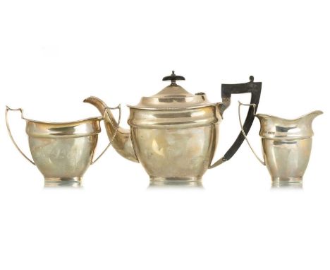 GEORGE V THREE PIECE SILVER TEA SERVICE,  EMILE VINER, SHEFFIELD 1932 of oblong form with gadrooned borders and leaf chased h