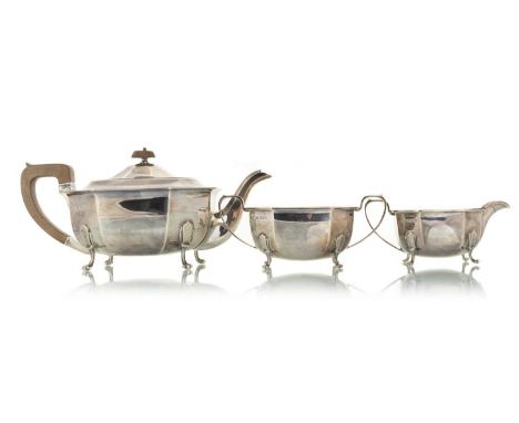 GEORGE VI SILVER THREE PIECE TEA SERVICE, EMILE VINER, SHEFFIELD 1937 of octagonal form, raised on quadruple feet, comprising