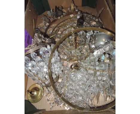 A vintage brass framed three tier bag light with hanging cut glass droplets together with a further similar brass framed exam