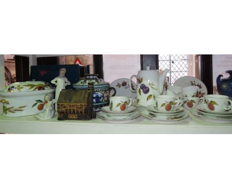 A collection of Royal Worcester Evesham pattern oven-to-table wares including an oval tureen and cover, coffee pot, milk jug,