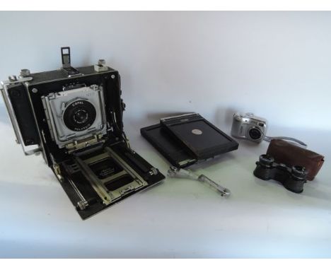 A good quality micro precision product 5 x 4 (MPP) case formal poloroid camera, fitted with a 1:45 F=75mm Tominon lens with c