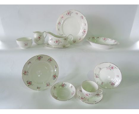An extensive collection of Crown Staffordshire and Mayfair china dinner, tea and coffee wares with matching rose and other fl