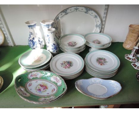 A collection of early 20th century dessert wares with printed floral sprays comprising one high and four low comports and ten