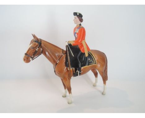 A Beswick model of Her Majesty Queen Elizabeth II mounted on Imperial, trooping the colour 1957