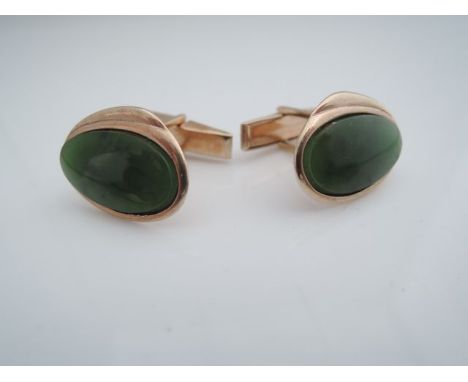 A pair of nephrite jade cufflinks, in 9ct rose gold, 9.7g in total (2)