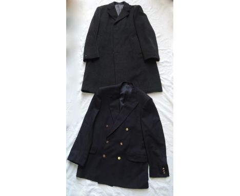 A gentleman's vintage woollen overcoat in a charcoal grey colourway bearing internal labels Dunn & Co, Great Britain, also be